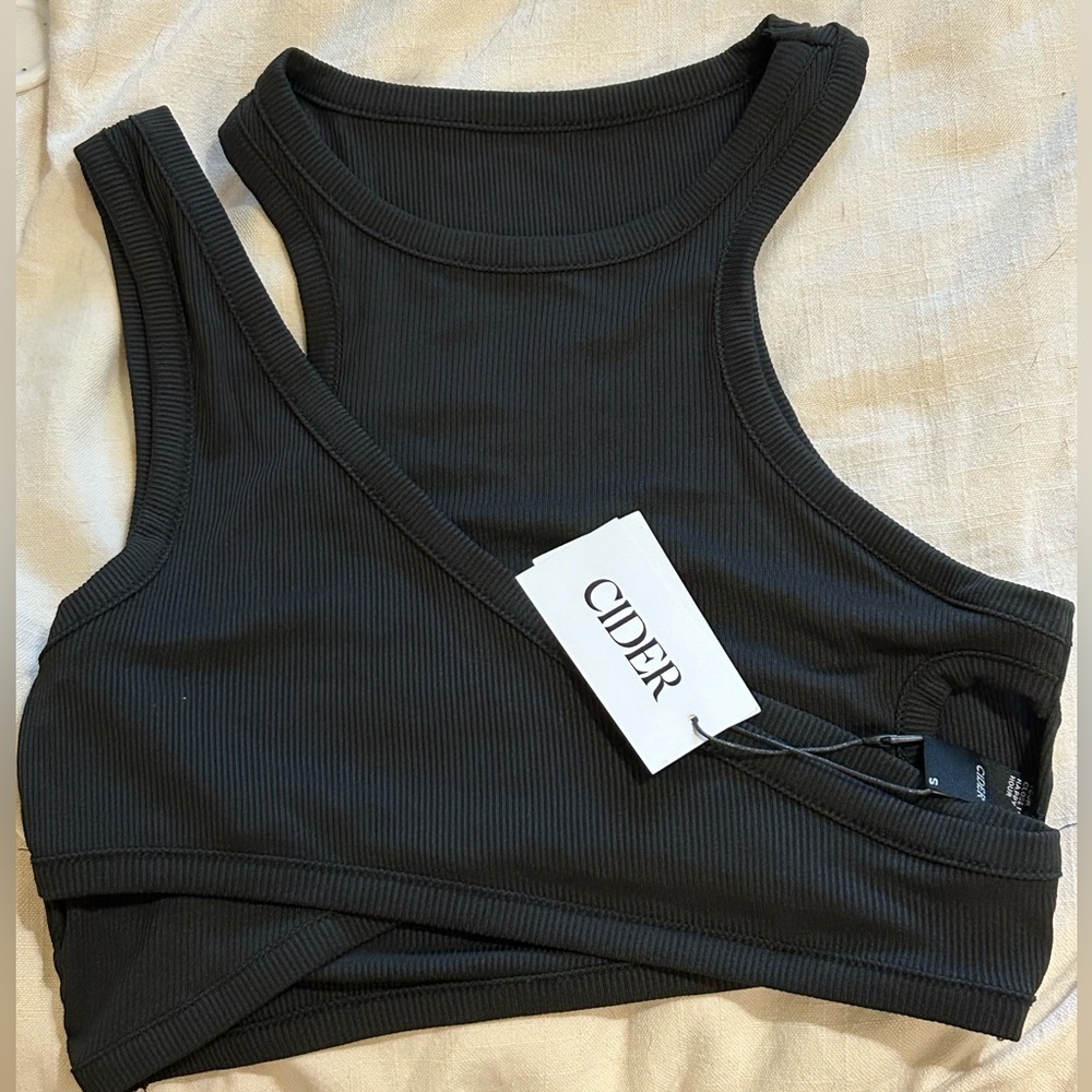 Two crop tops, new- never worn. Black and green.